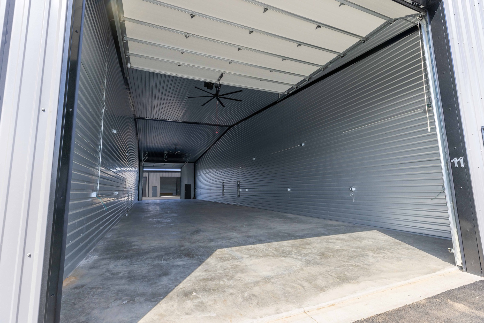 Empty garage condo unit ready for a custom build-out